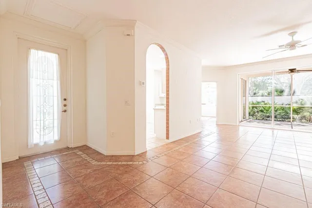 a view of a room with a hallway