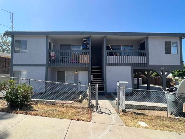 a view of a building with a patio
