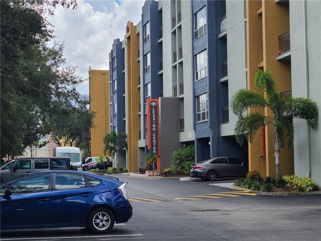 a car parked in front of a building
