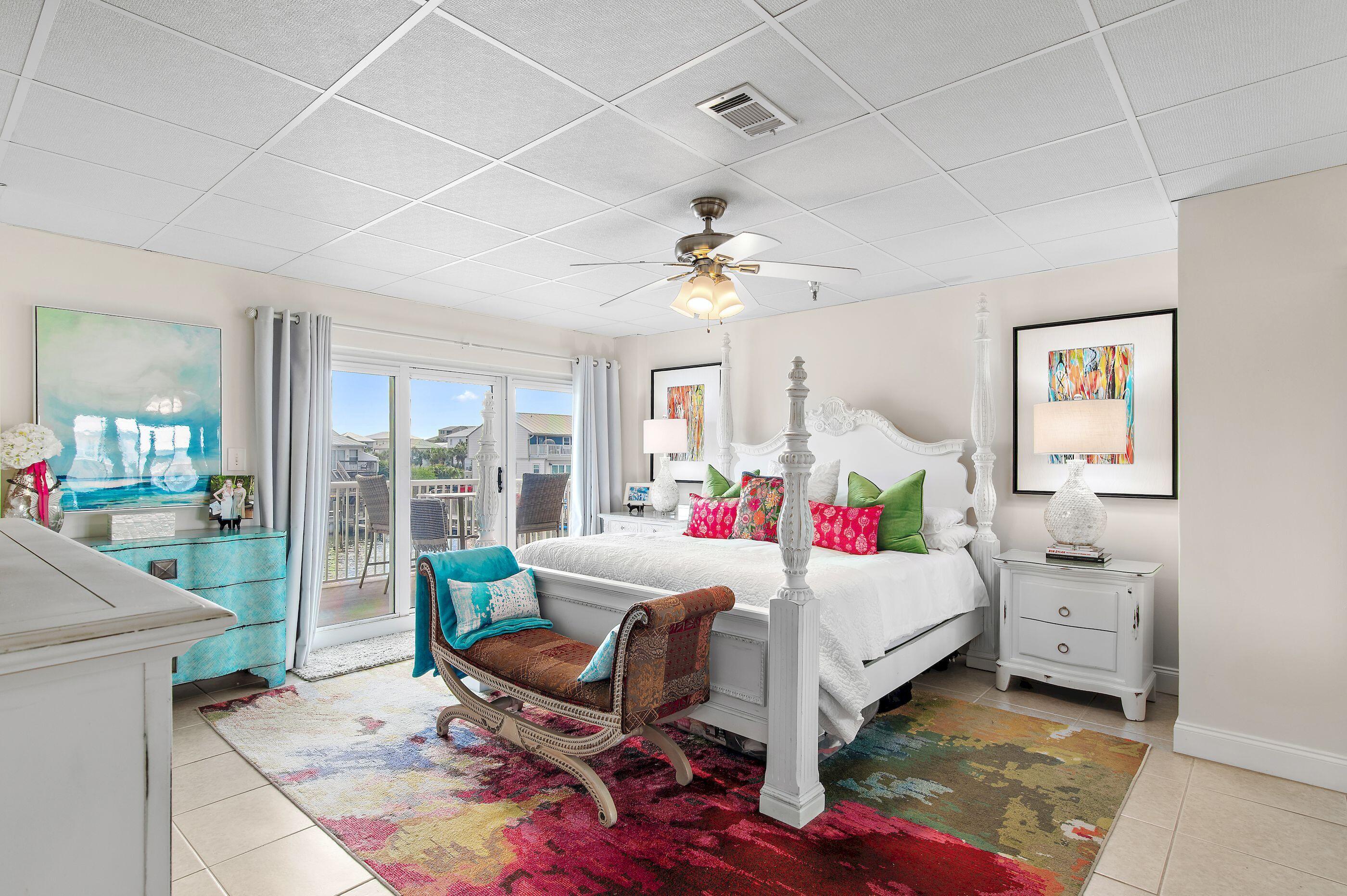 197 Durango Road, Unit 2B Destin, FL 32541 - Photo 12 of 29 a room that has a couch and a table in it