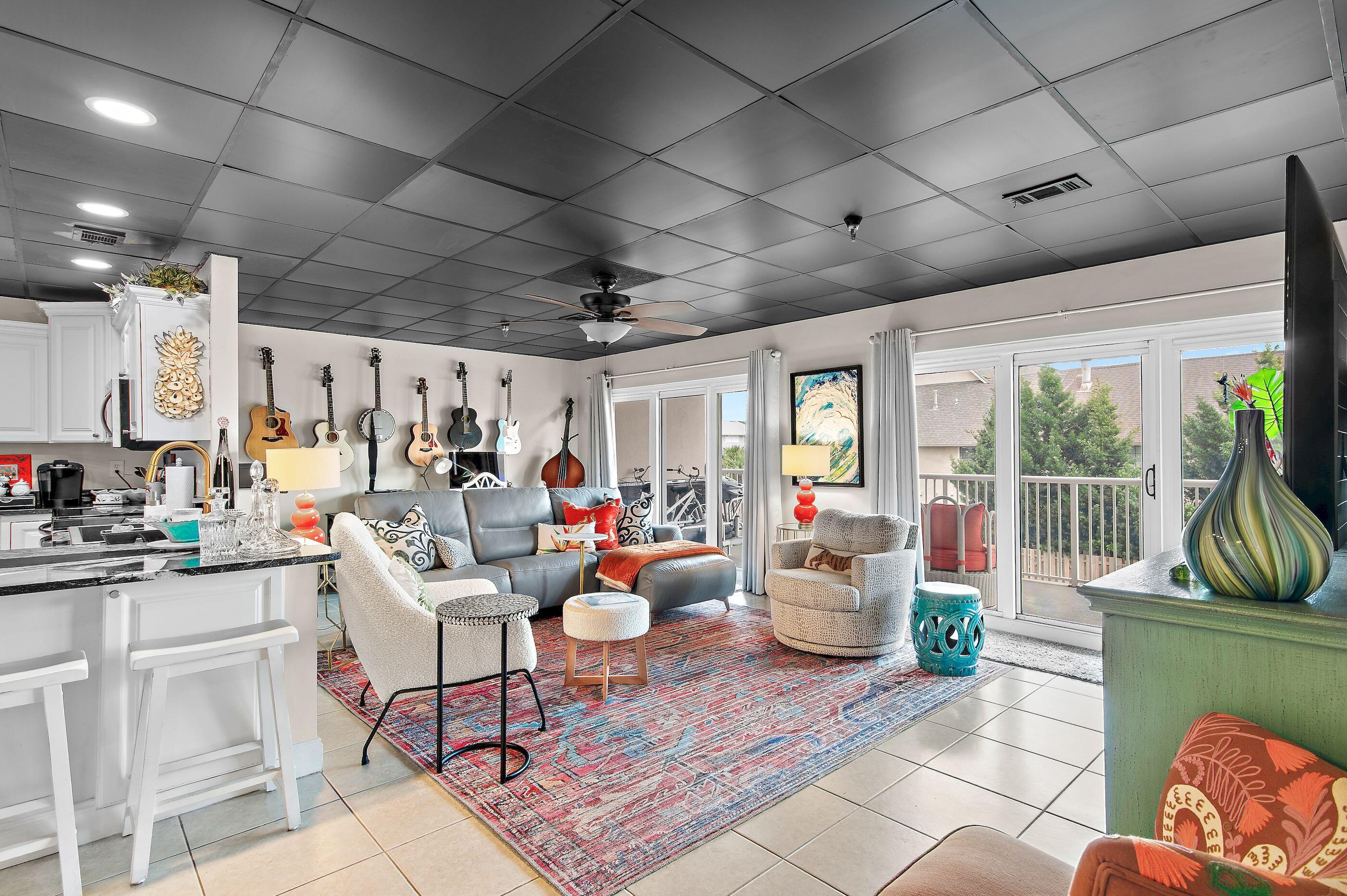 197 Durango Road, Unit 2B Destin, FL 32541 - Photo 2 of 29 a living room with furniture and a large window