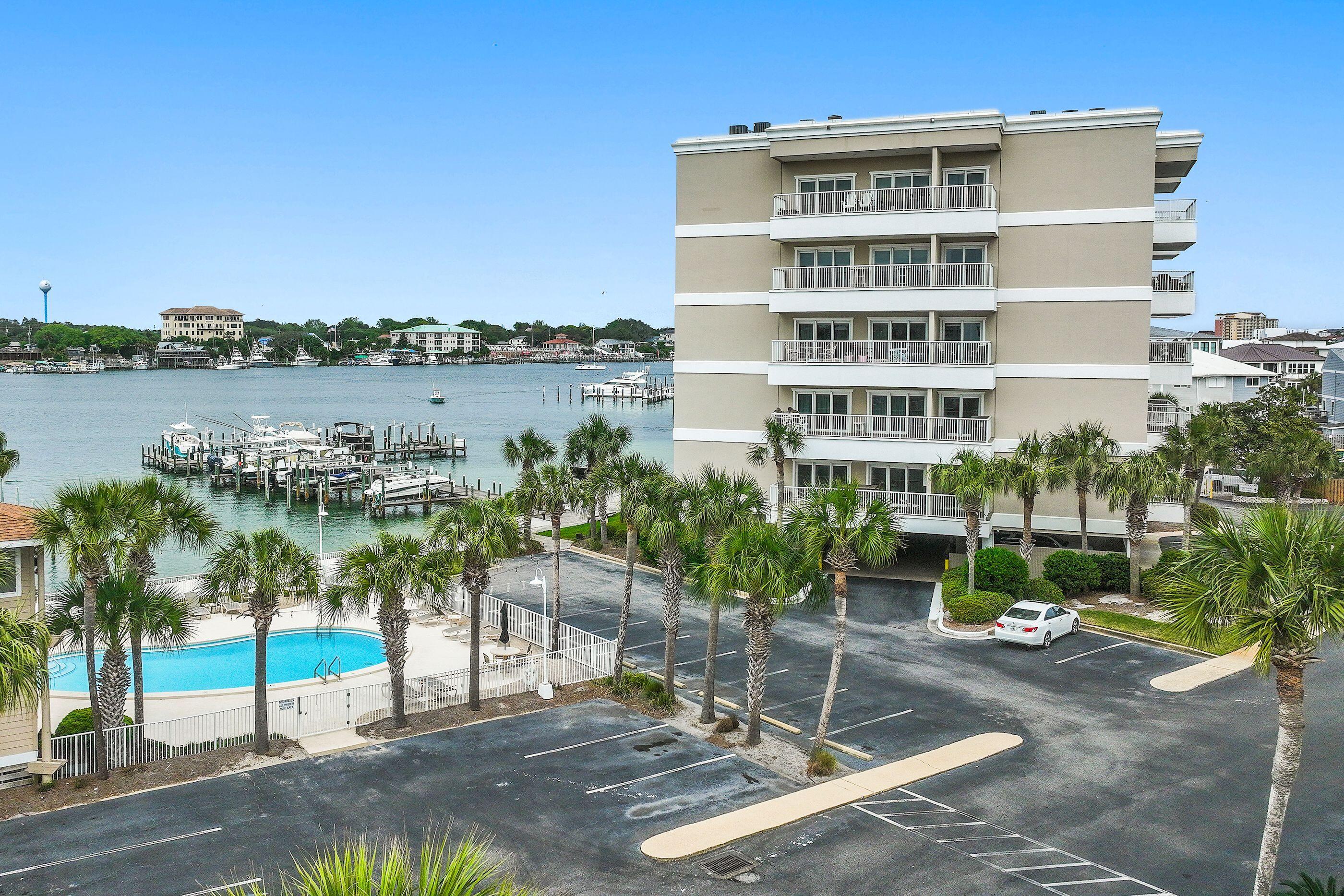 197 Durango Road, Unit 2B Destin, FL 32541 - Photo 22 of 29 a view of a lake with a building in the background