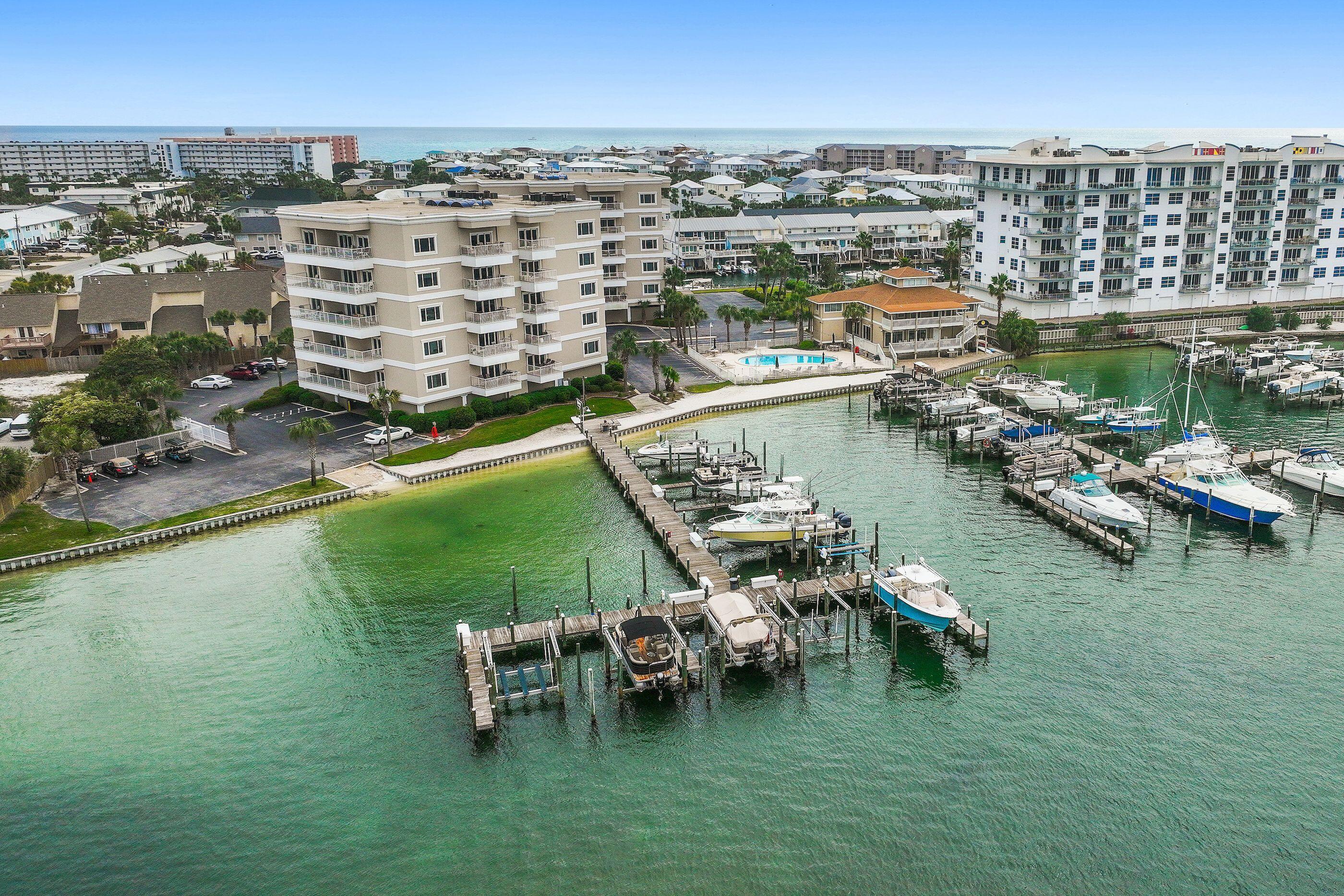 197 Durango Road, Unit 2B Destin, FL 32541 - Photo 28 of 29 a view of a lake with tall buildings