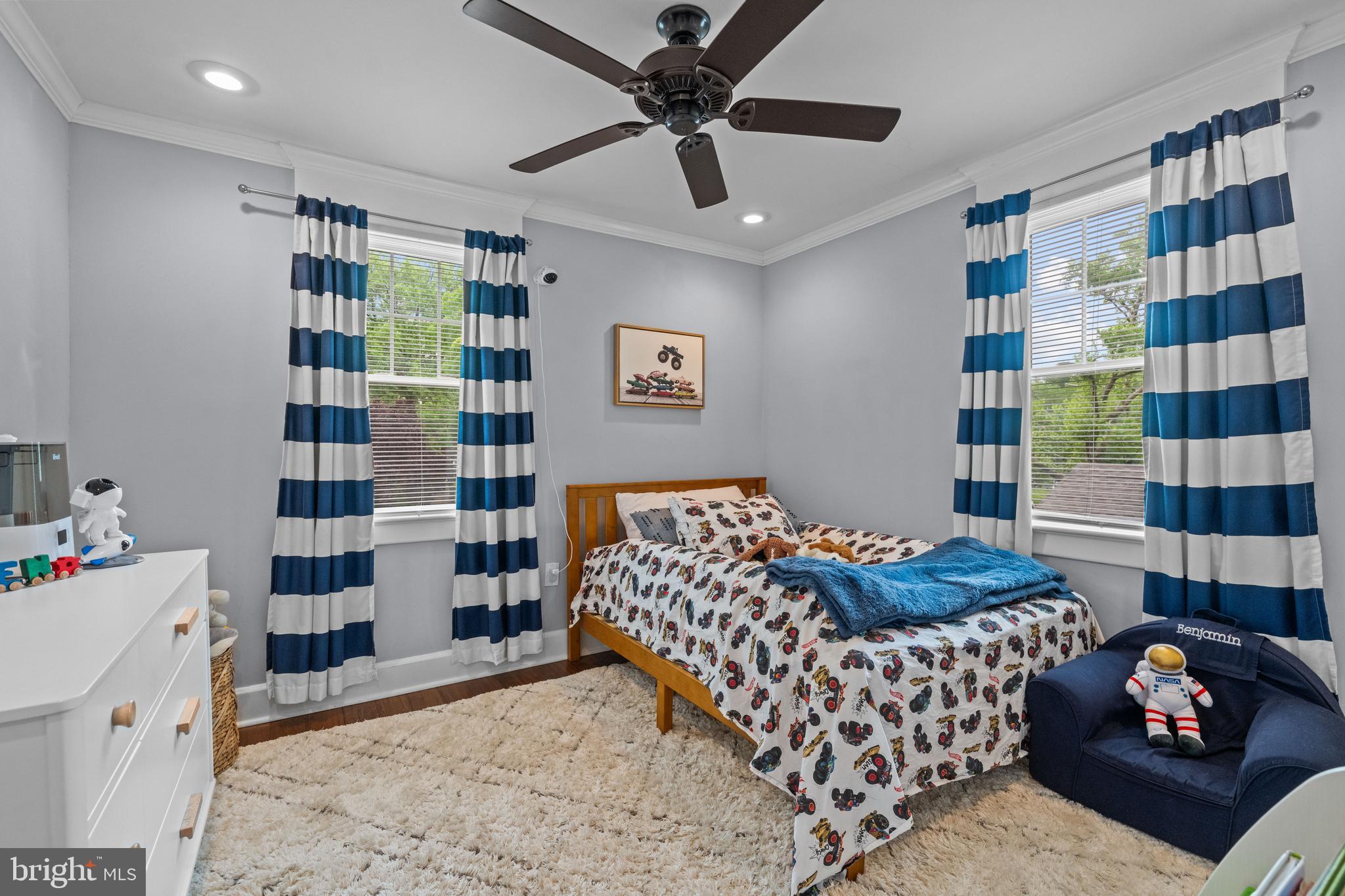614 Maple Avenue Haddonfield, NJ 08033 - Photo 25 of 42 a bedroom with a bed and a bookshelf