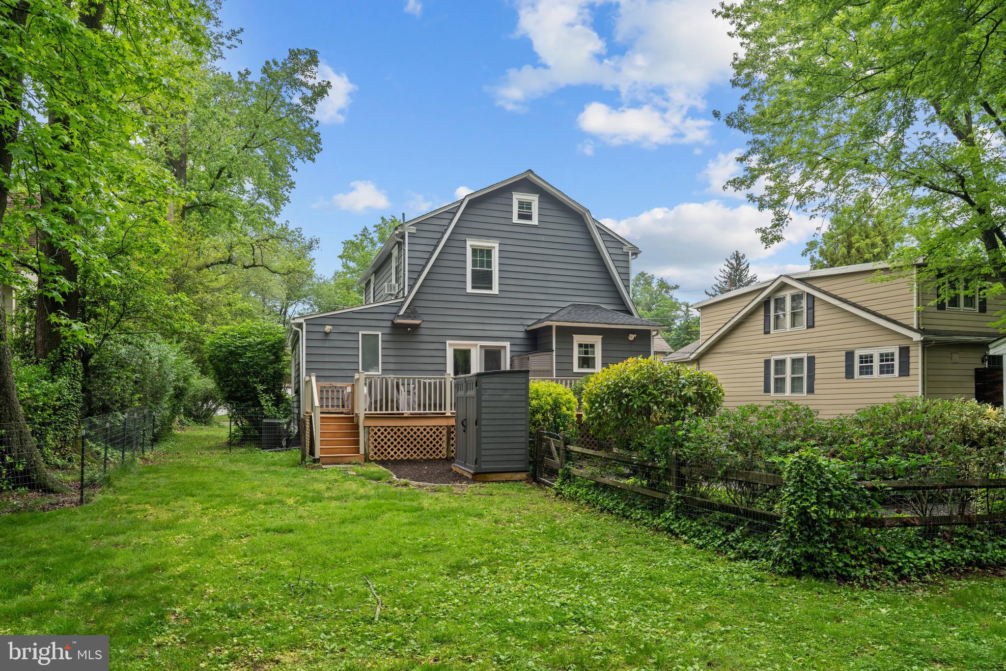 614 Maple Avenue Haddonfield, NJ 08033 - Photo 38 of 42 a front view of a house with a garden