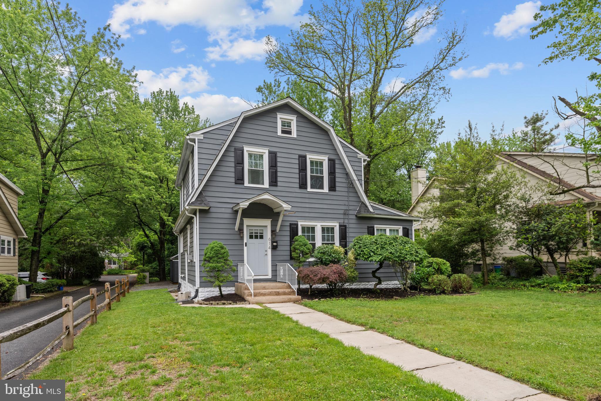 614 Maple Avenue Haddonfield, NJ 08033 - Photo 7 of 42 a front view of a house with a yard