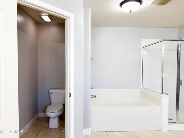 a view of a hallway with a white walls