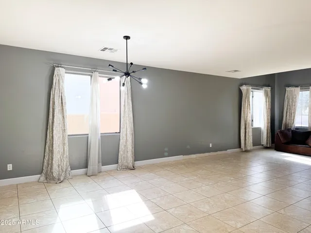 a view of a room with a chandelier