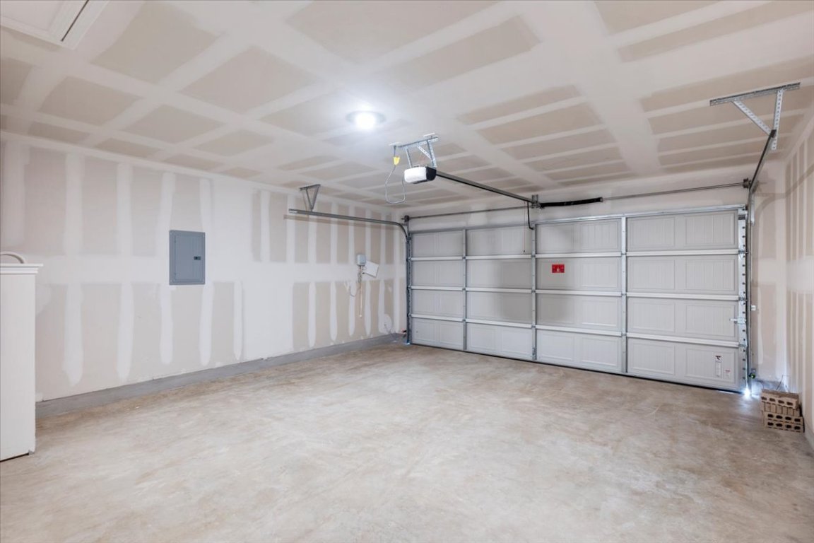 221 Rodney Boat Road Kyle, TX 78640 - Photo 20 of 33 Garage featuring electric panel