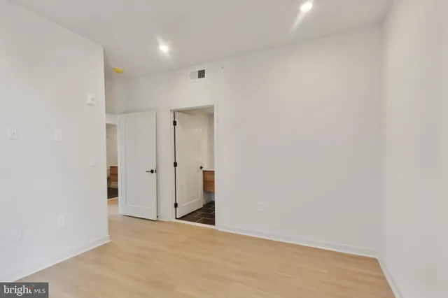 a bathroom with a toilet and a sink