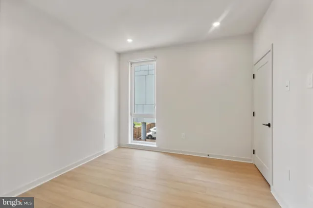 a view of livingroom with hardwood floor and entrance
