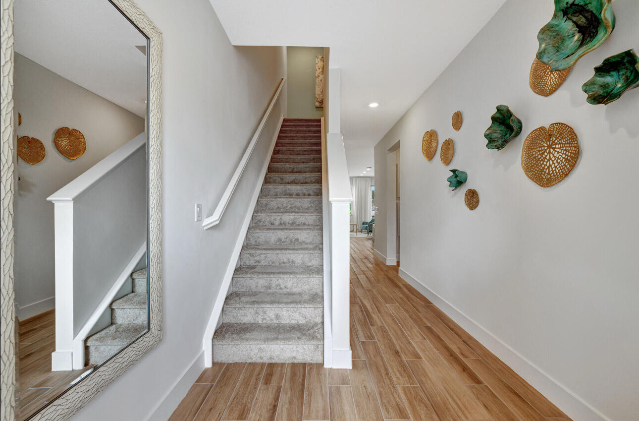 608 Waters Edge Lane, Unit 2202 Port St. Lucie, FL 34983 - Photo 12 of 19 a view of entryway with wooden floor