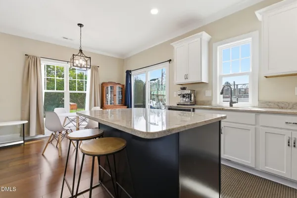 a view of entryway with wooden floor and window
