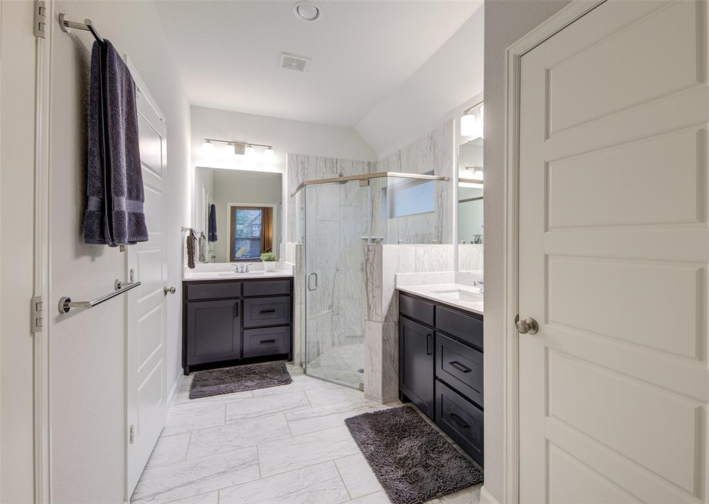 162 Palo Duro Bend Rhome, TX 76078 - Photo 15 of 25 Large primary bath with toilet room and walk-in shower and access to the closet