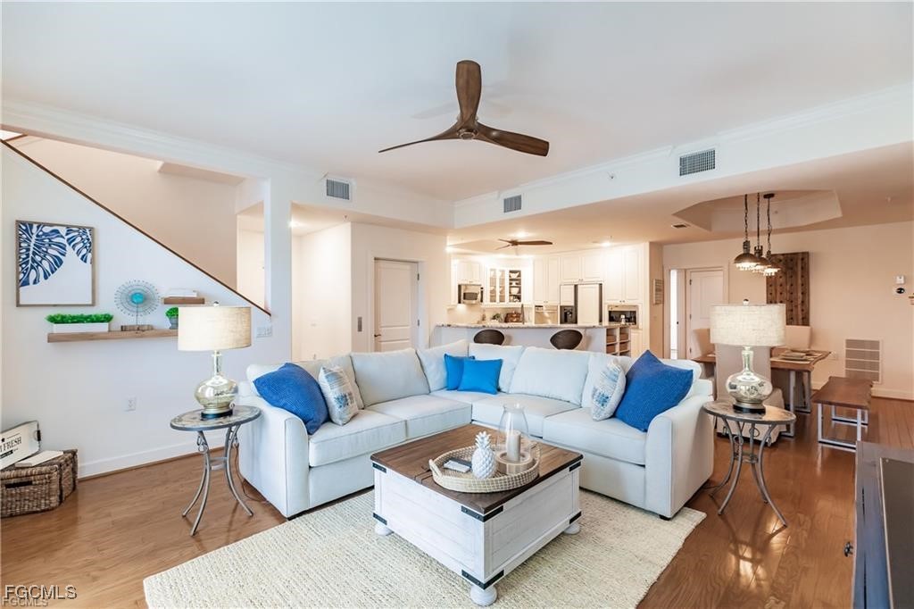 572 11th Avenue South, Unit 2 Naples, FL 34102 - Photo 1 of 28 a living room with furniture