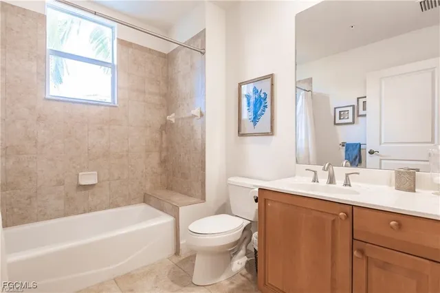 a bathroom with a sink a toilet and a bathtub