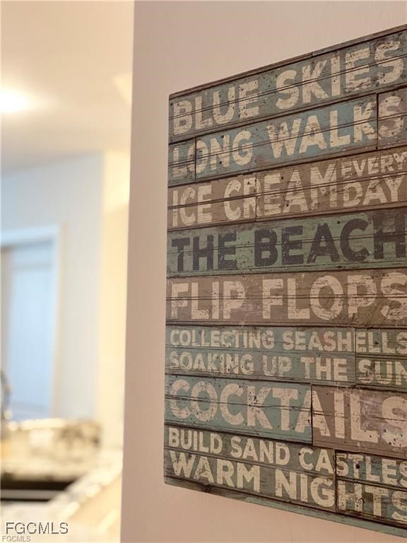 572 11th Avenue South, Unit 2 Naples, FL 34102 - Photo 14 of 28 a black and white photo of a mirror