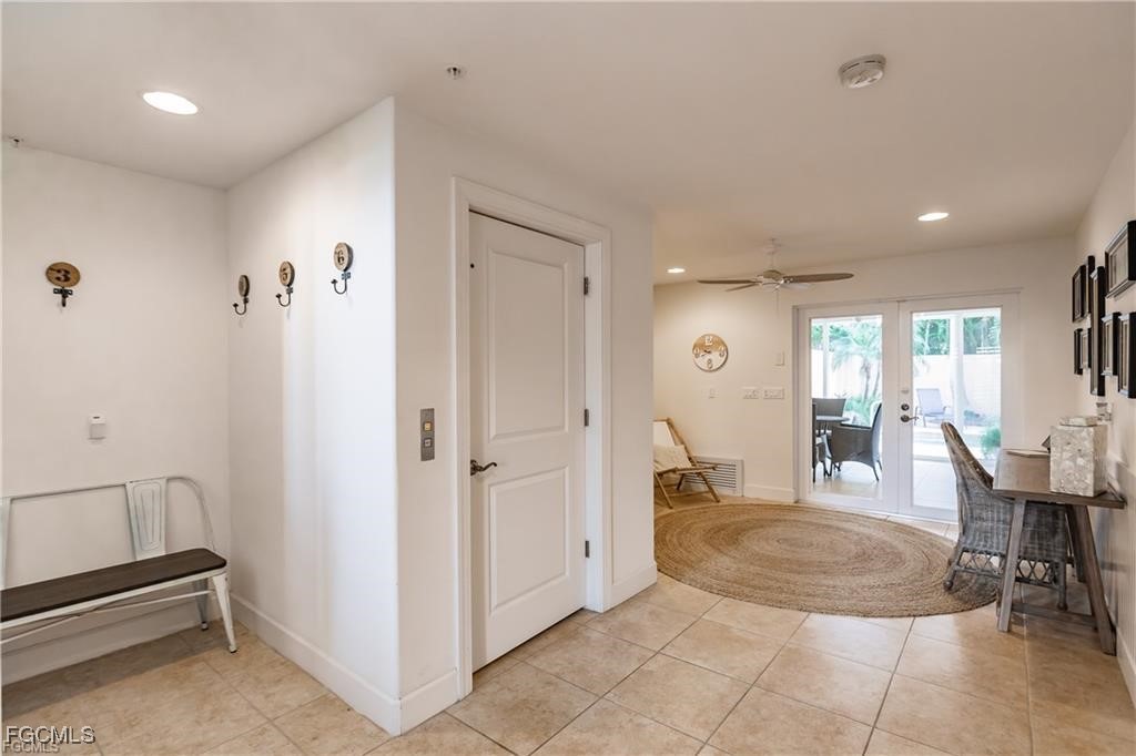 572 11th Avenue South, Unit 2 Naples, FL 34102 - Photo 20 of 28 a view of a room with gym equipment