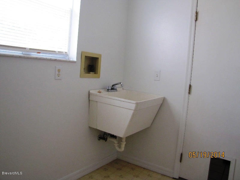 6055 Elgin Road Cocoa, FL 32927 - Photo 25 of 42 INTERIOR LAUNDRY ROOM
