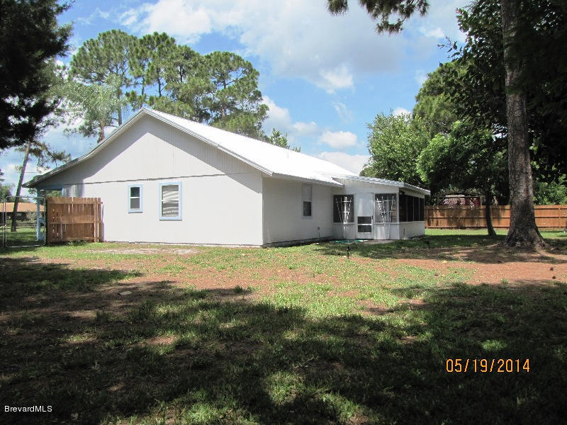 6055 Elgin Road Cocoa, FL 32927 - Photo 42 of 42 RIGHT REAR OF HOUSE