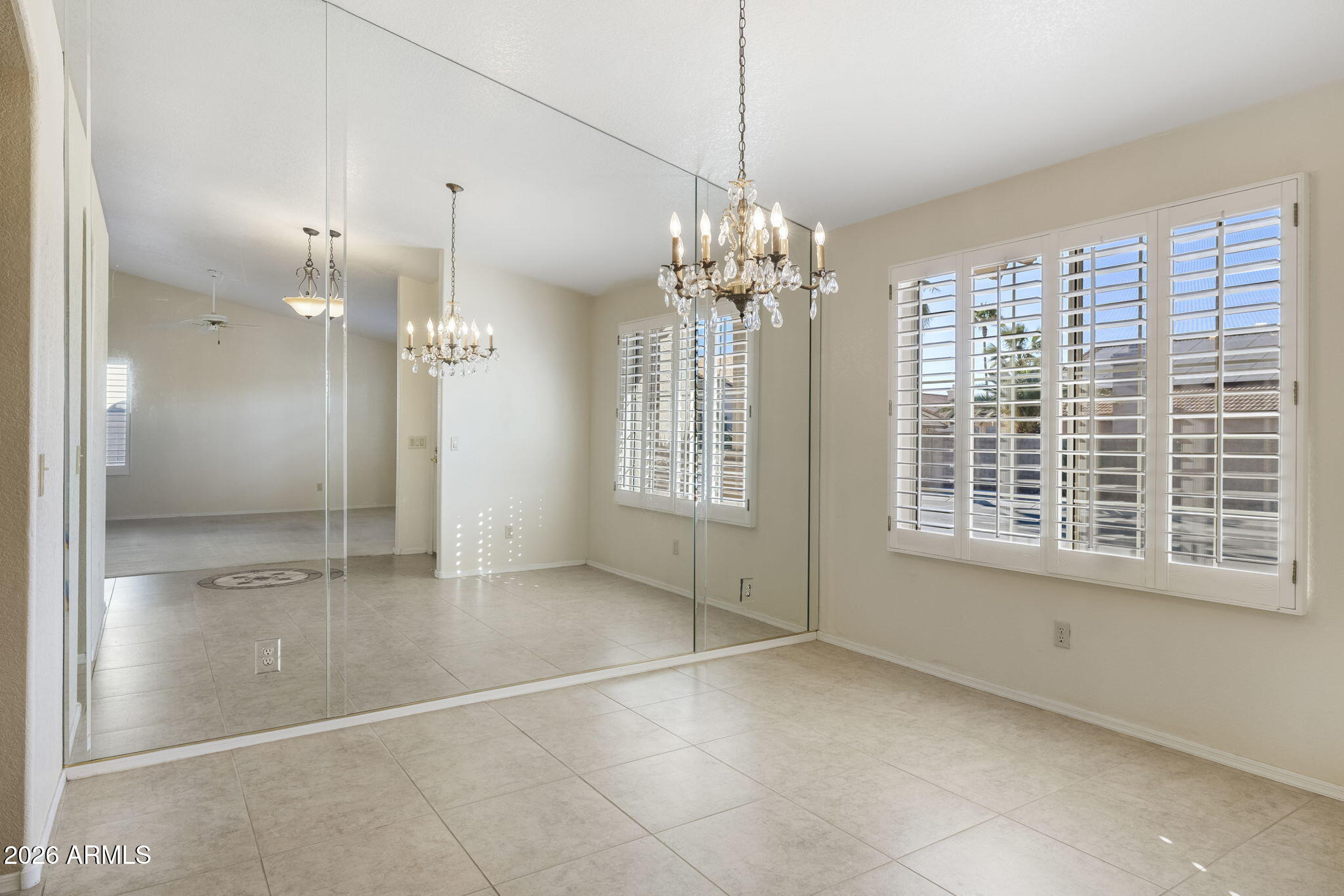 20659 North 110th Avenue Peoria, AZ 85373 - Photo 21 of 85 a view of an empty room with a window