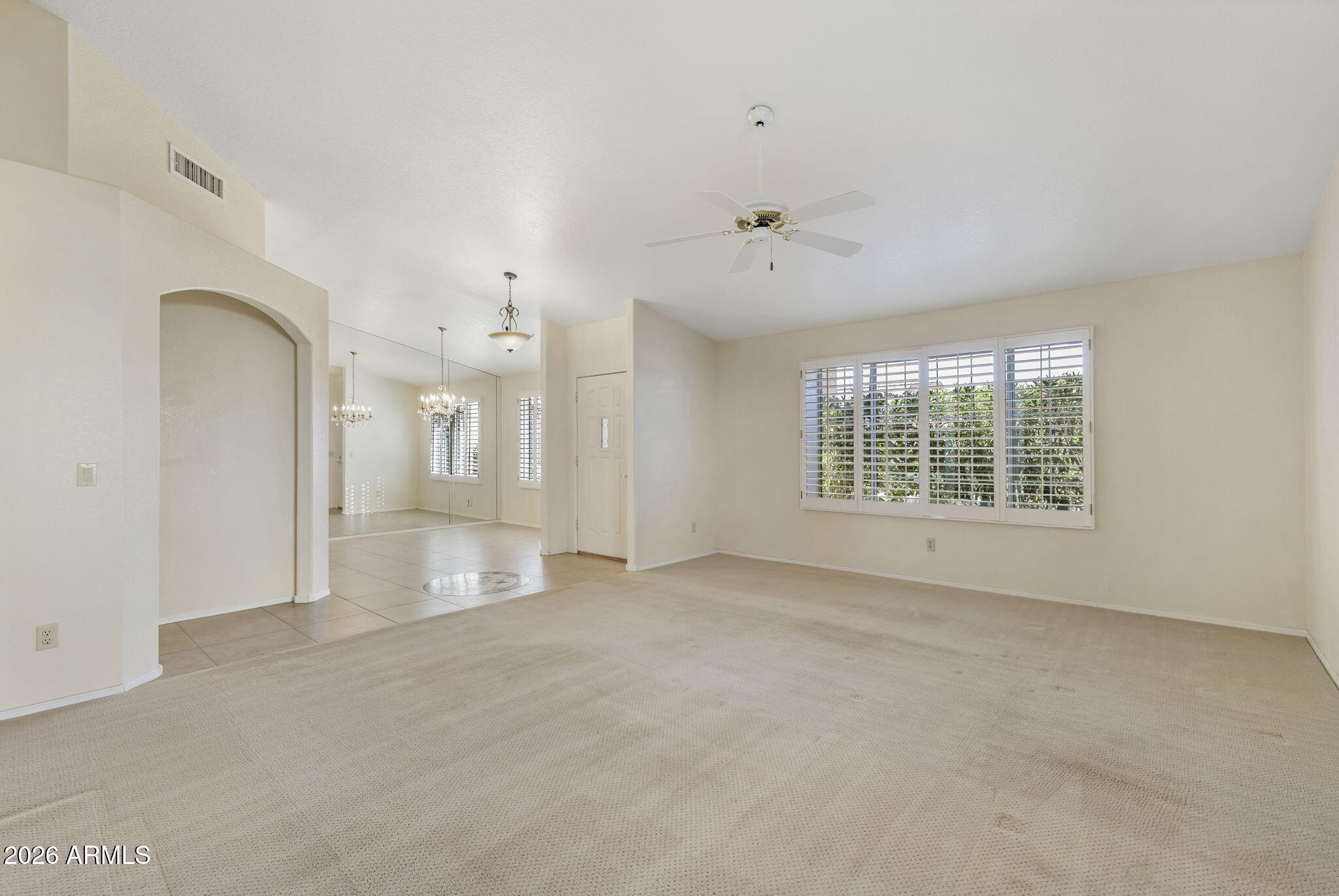 20659 North 110th Avenue Peoria, AZ 85373 - Photo 25 of 85 a view of an empty room with a window
