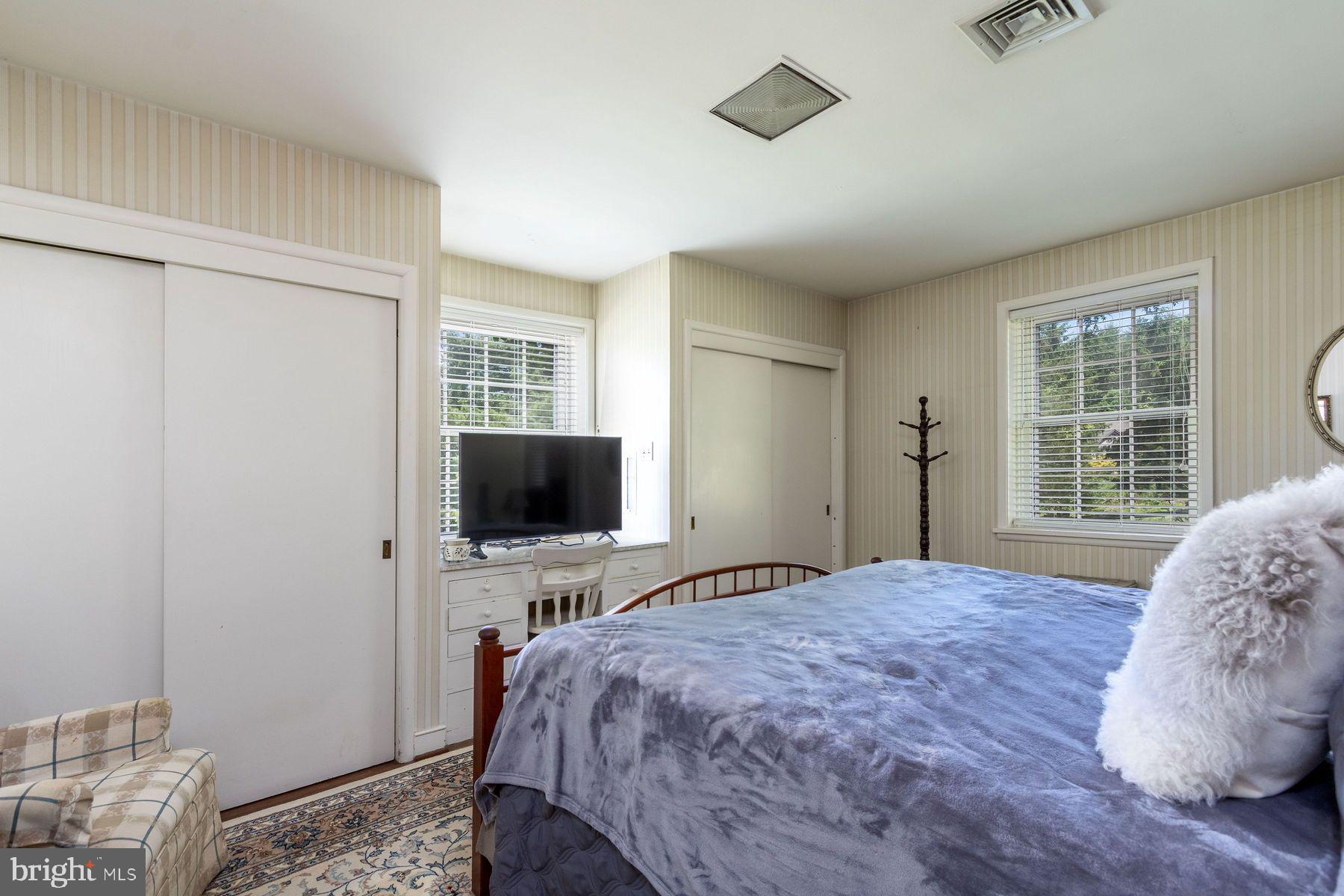 2349 Valley Road Jamison, PA 18929 - Photo 29 of 53 a bedroom with a bed window and flat screen tv