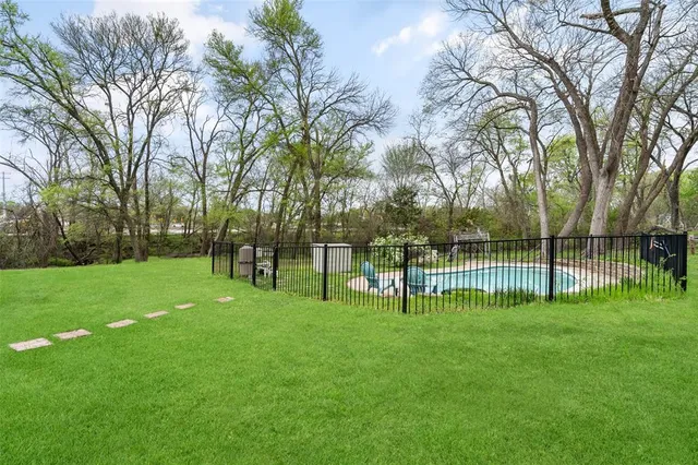 a view of field with trees