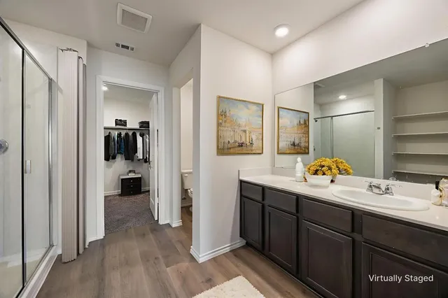 a bathroom with a sink and mirror