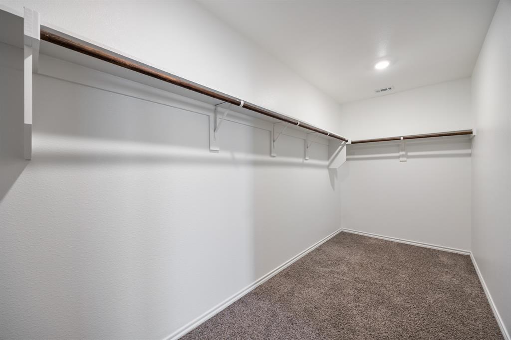 2811 Jasmine Drive Sherman, TX 75092 - Photo 16 of 22 a view of an empty walk in closet