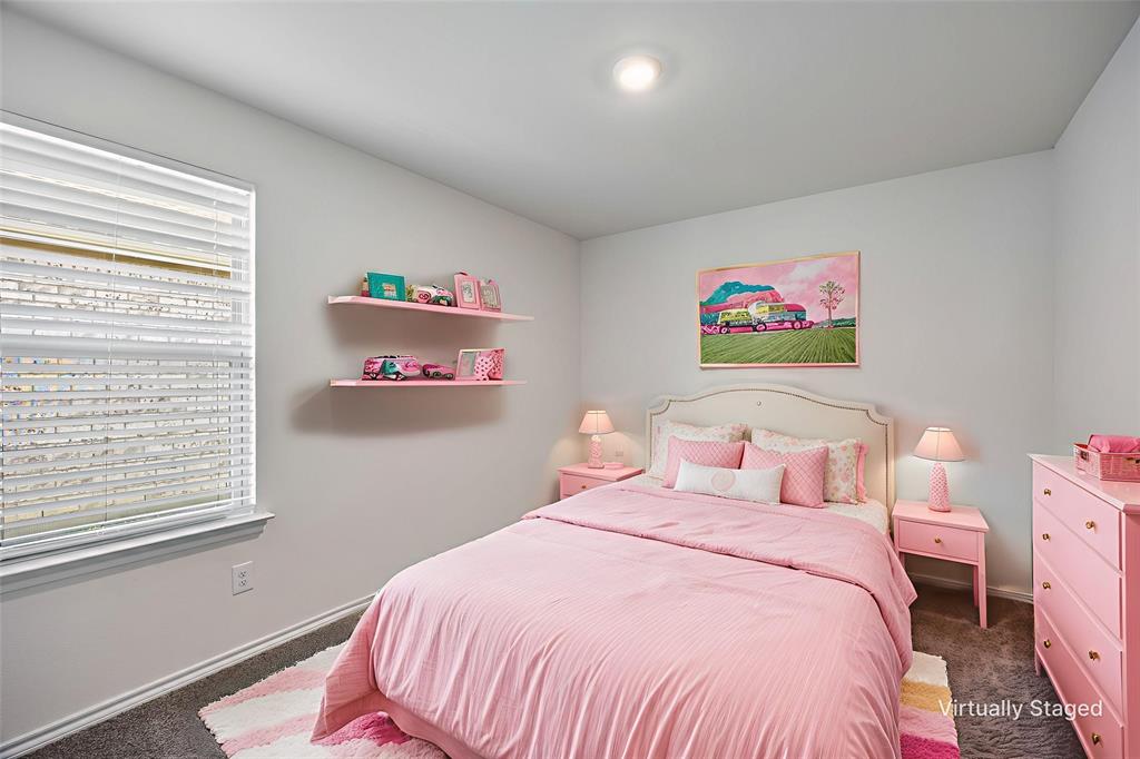 2811 Jasmine Drive Sherman, TX 75092 - Photo 17 of 22 a bedroom with a bed and a large window