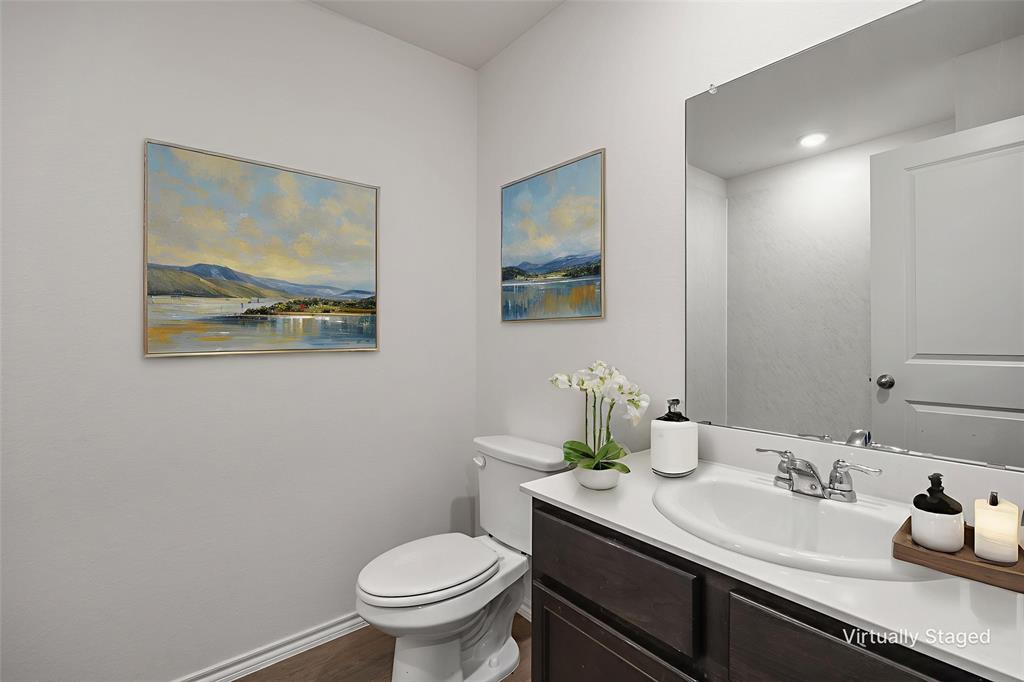 2811 Jasmine Drive Sherman, TX 75092 - Photo 18 of 22 a bathroom with a granite countertop sink mirror and toilet