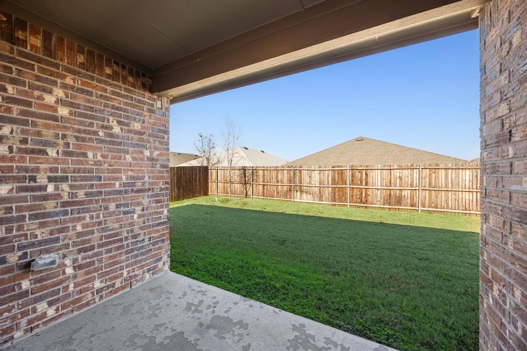 2811 Jasmine Drive Sherman, TX 75092 - Photo 21 of 22 a view of a big house with a big yard and large tree