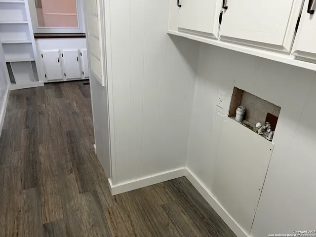 a view of small space with wooden floor