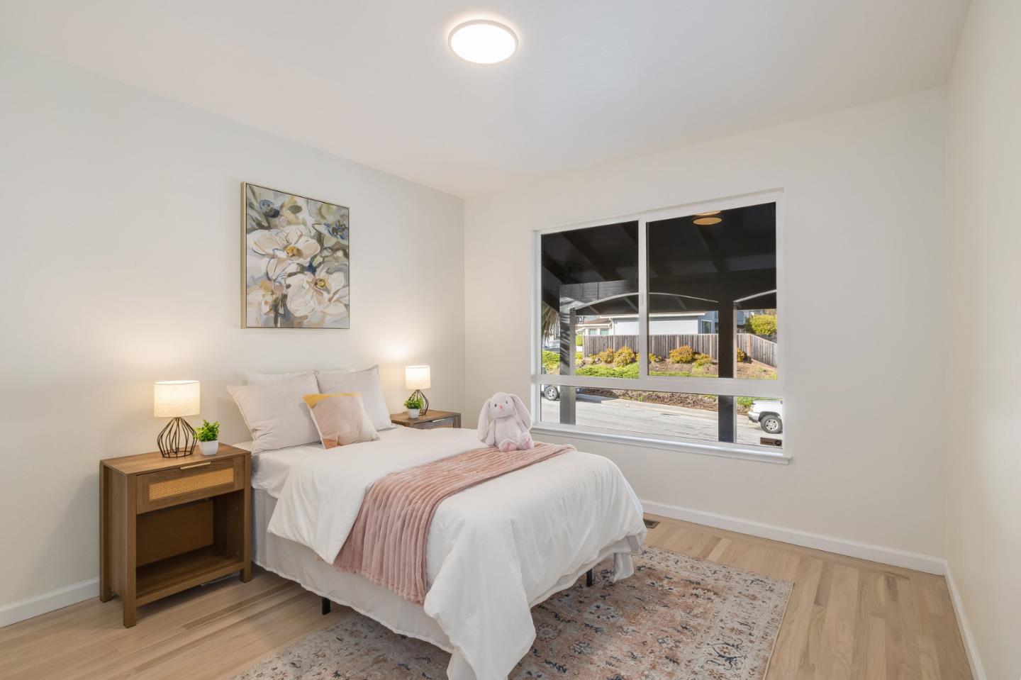 121 Riverside Drive San Bruno, CA 94066 - Photo 20 of 66 a bedroom with a bed and a window