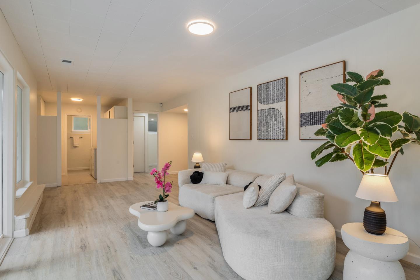 121 Riverside Drive San Bruno, CA 94066 - Photo 25 of 66 a living room with furniture and a potted plant