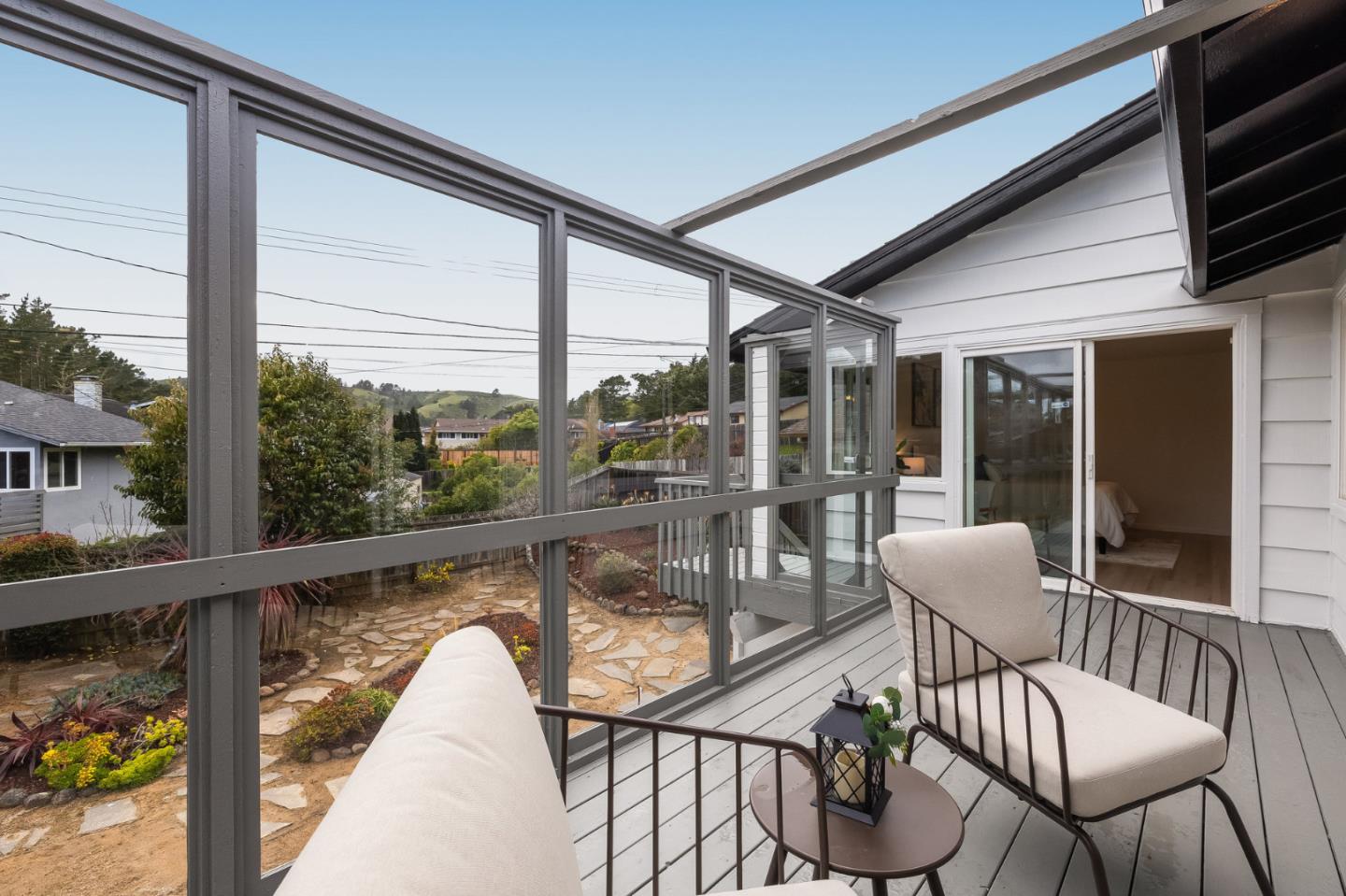 121 Riverside Drive San Bruno, CA 94066 - Photo 31 of 66 a view of a chair and tables in the balcony