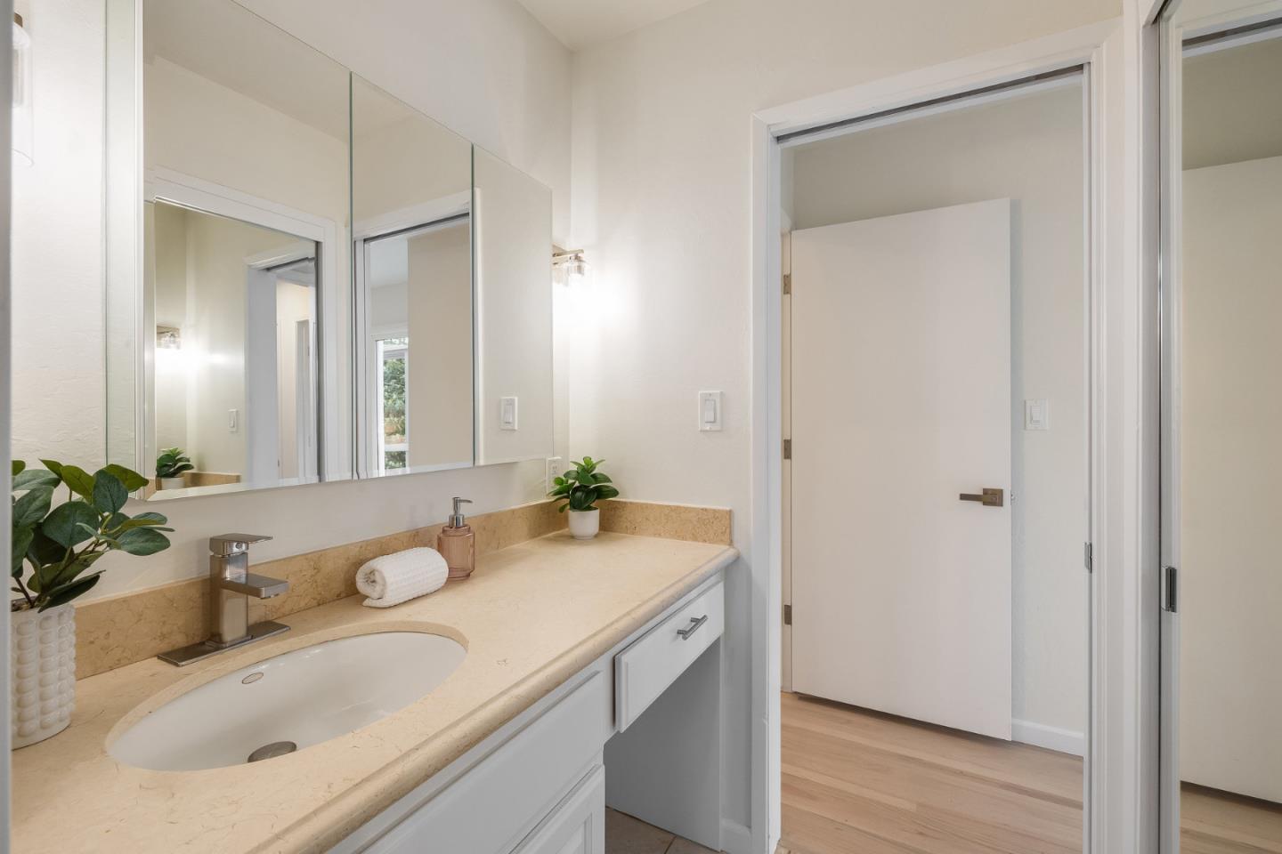 121 Riverside Drive San Bruno, CA 94066 - Photo 36 of 66 a bathroom with a sink and a mirror