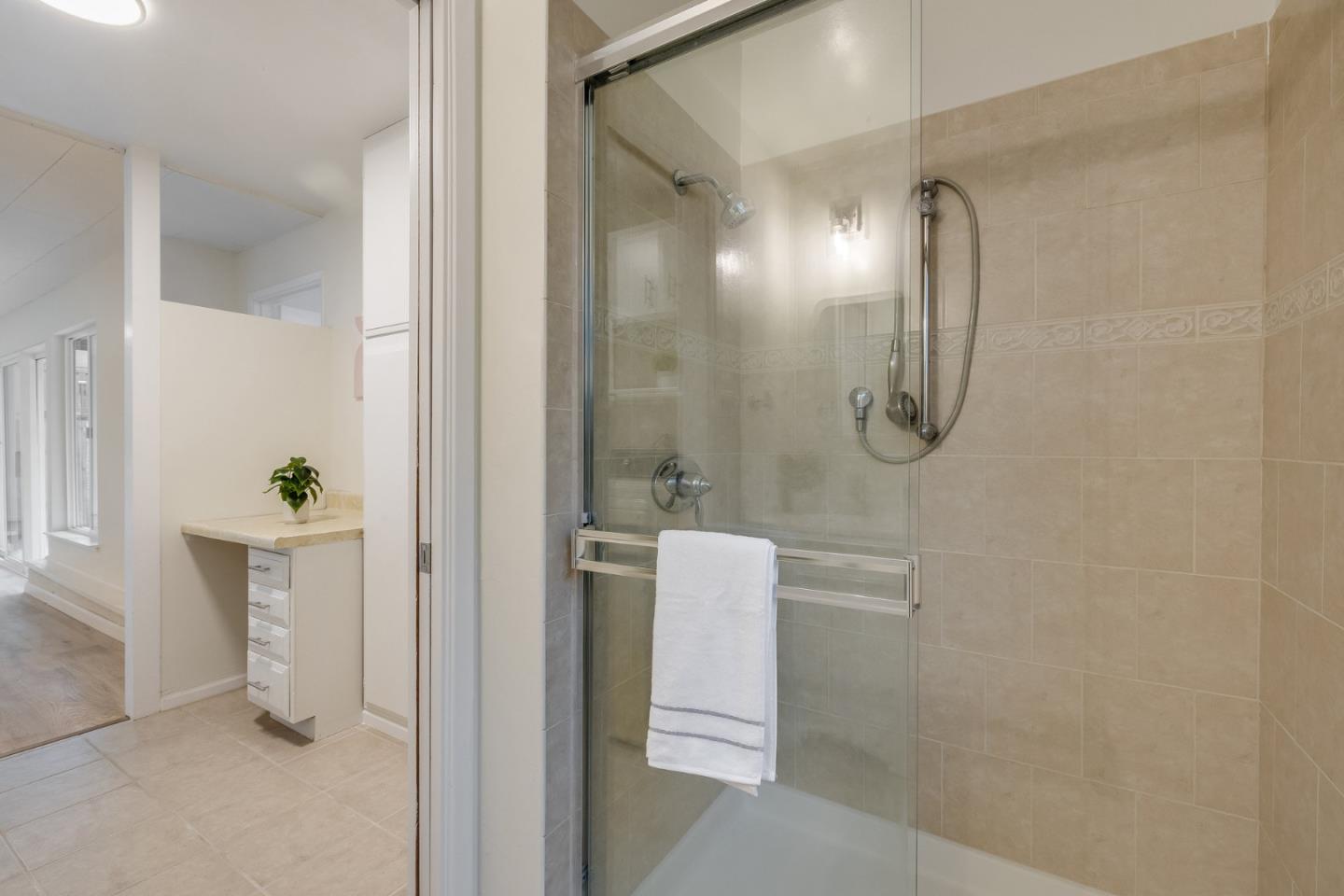 121 Riverside Drive San Bruno, CA 94066 - Photo 41 of 66 a bathroom with a shower and a sink