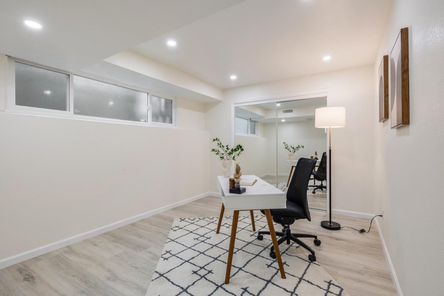 121 Riverside Drive San Bruno, CA 94066 - Photo 43 of 66 a workspace with furniture and wooden floor