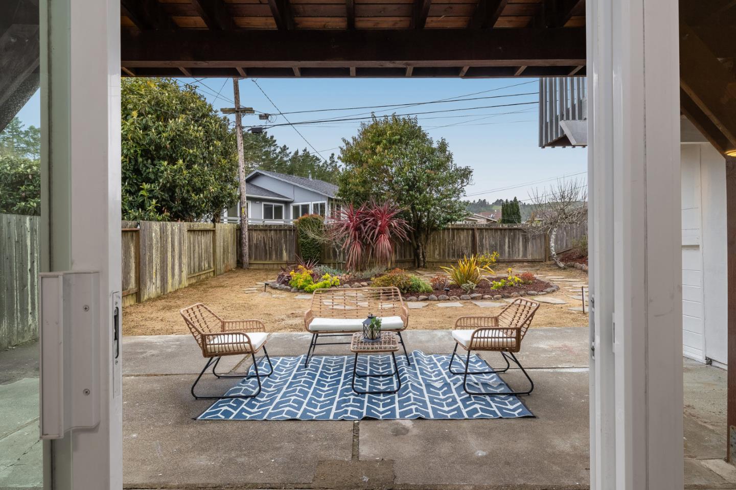 121 Riverside Drive San Bruno, CA 94066 - Photo 45 of 66 a view of a house with backyard and sitting area