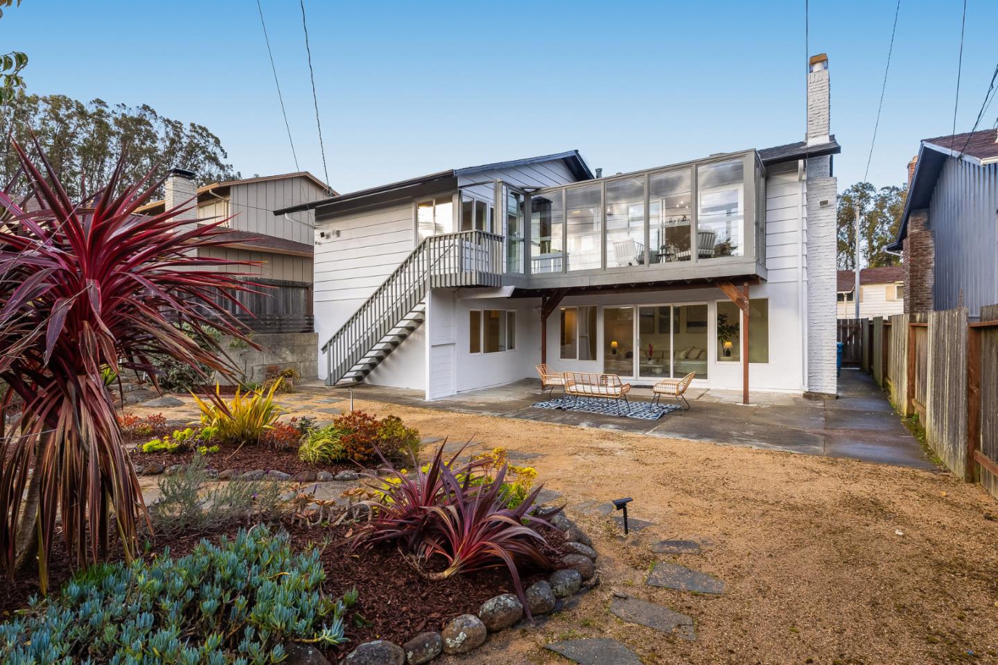 121 Riverside Drive San Bruno, CA 94066 - Photo 49 of 66 a front view of a house with a yard
