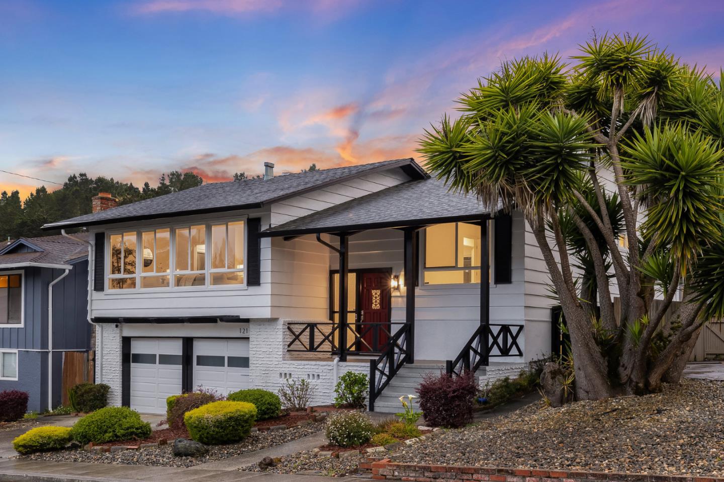 121 Riverside Drive San Bruno, CA 94066 - Photo 59 of 66 a front view of a house with garden