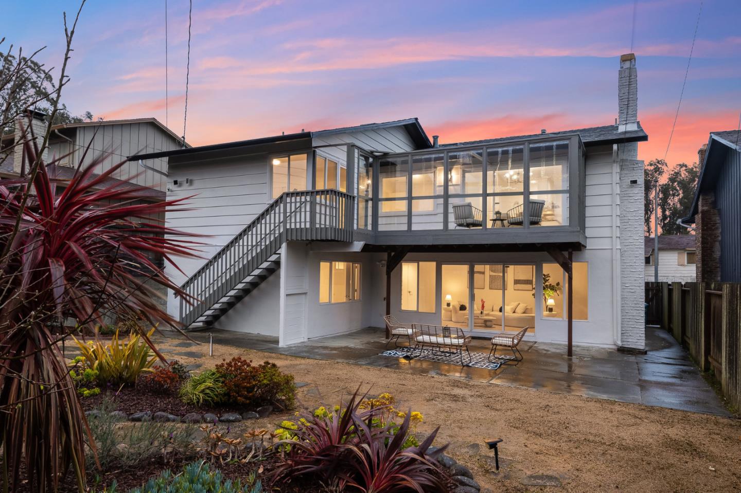 121 Riverside Drive San Bruno, CA 94066 - Photo 65 of 66 a backyard of a house with table and chairs