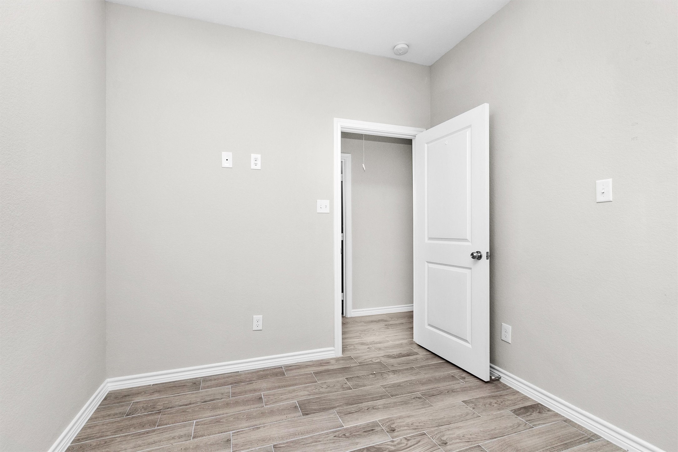 16706 East Hammon Montgomery, TX 77316 - Photo 17 of 26 a view of an empty room with wooden floor