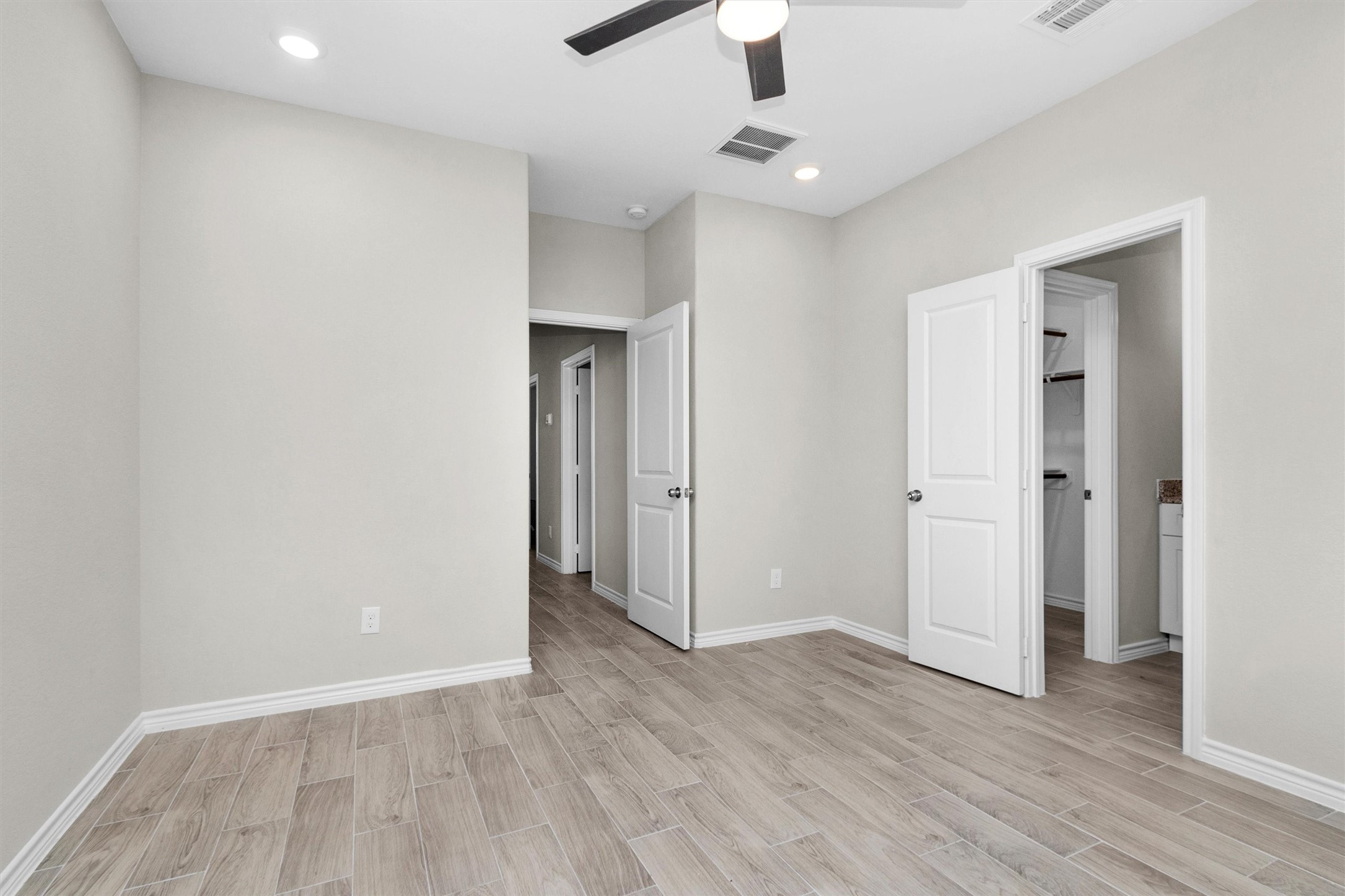 16706 East Hammon Montgomery, TX 77316 - Photo 21 of 26 wooden floor in an empty room with a window