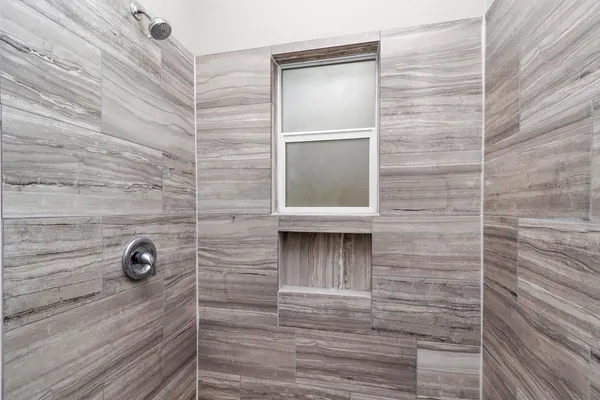 a view of door with wooden floor