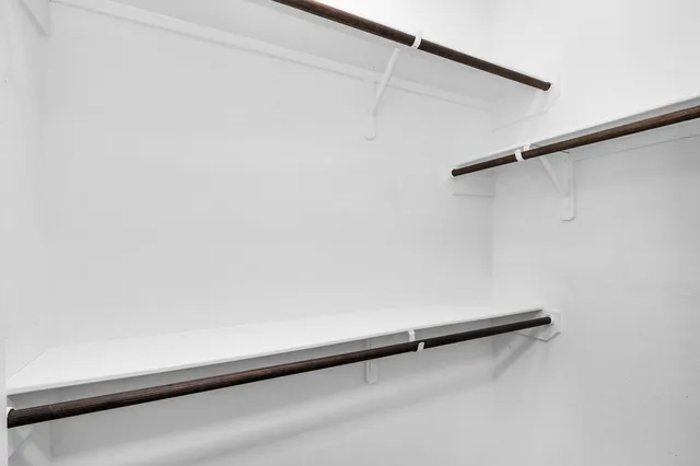 a view of a room with racks on the wall