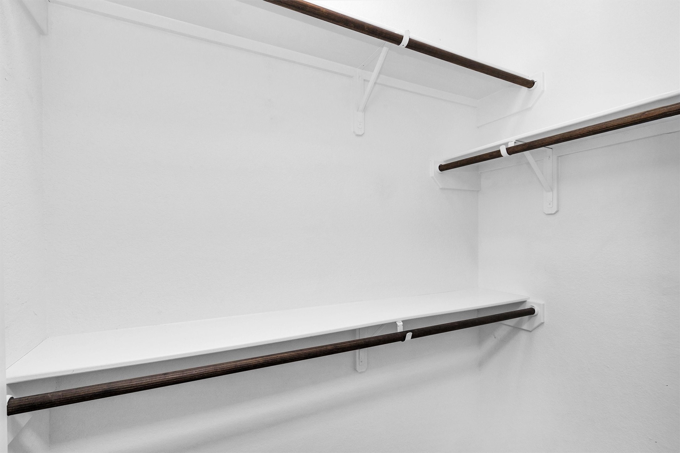 16706 East Hammon Montgomery, TX 77316 - Photo 25 of 26 a view of a room with racks on the wall