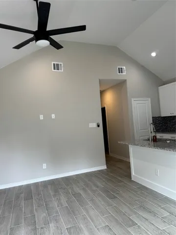 a view of a livingroom with a staircase